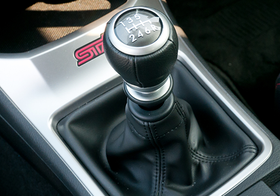 A close up of a shifter in a car