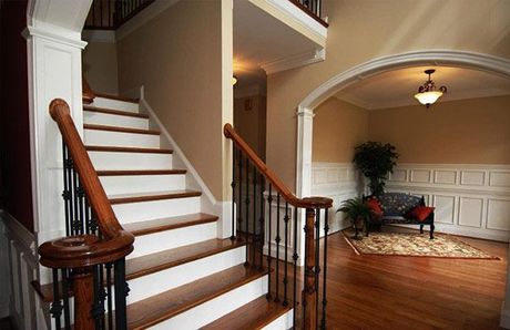 A set of stairs leading up to the second floor of a house