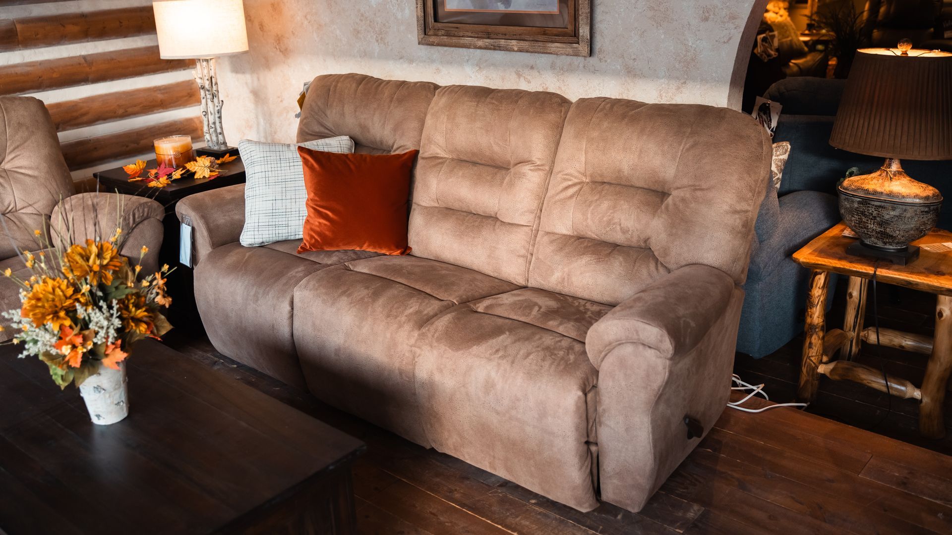 A living room filled with furniture and a couch.