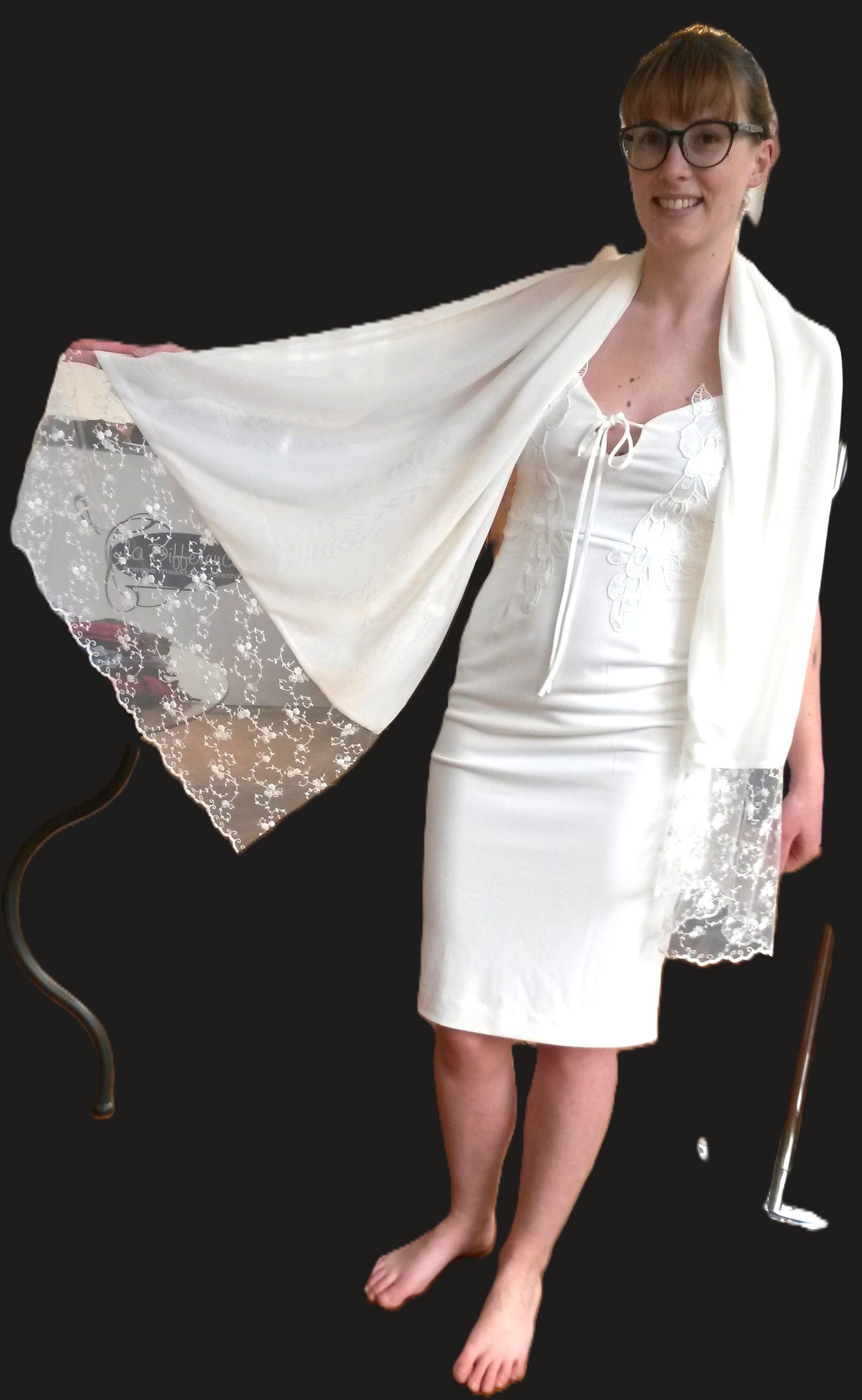 Een vrouw in haar trouwjurk bij La Difference