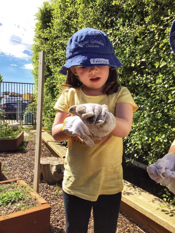 young girl gardening