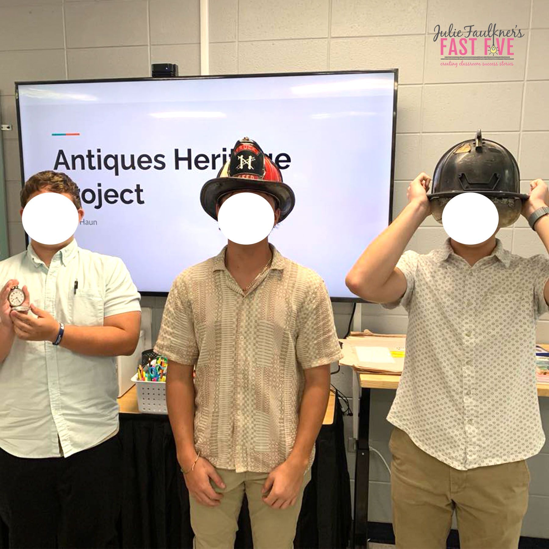 Three men are standing in front of a screen that says antiques heritage project