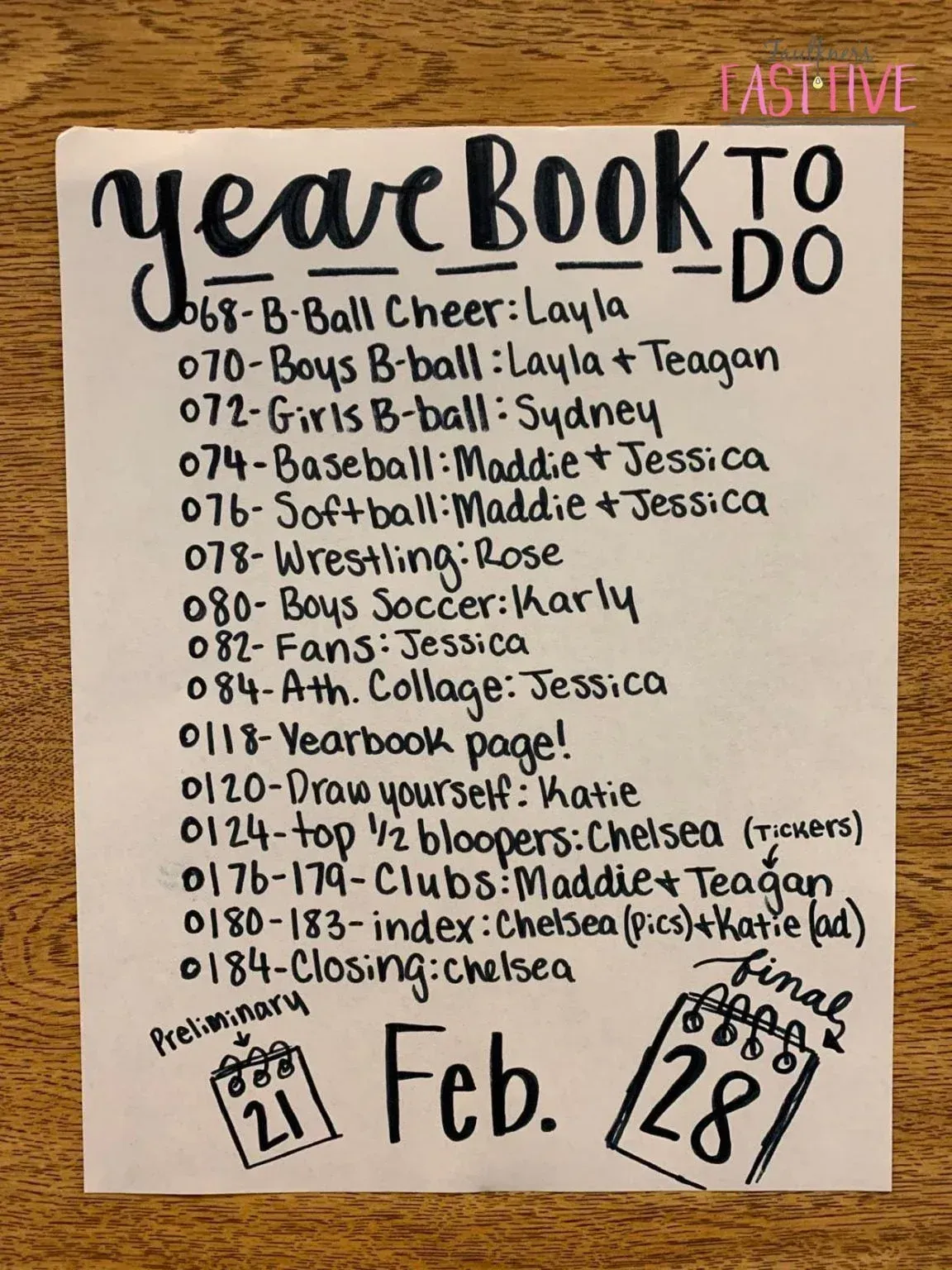 A piece of paper that says yearbook to do on it