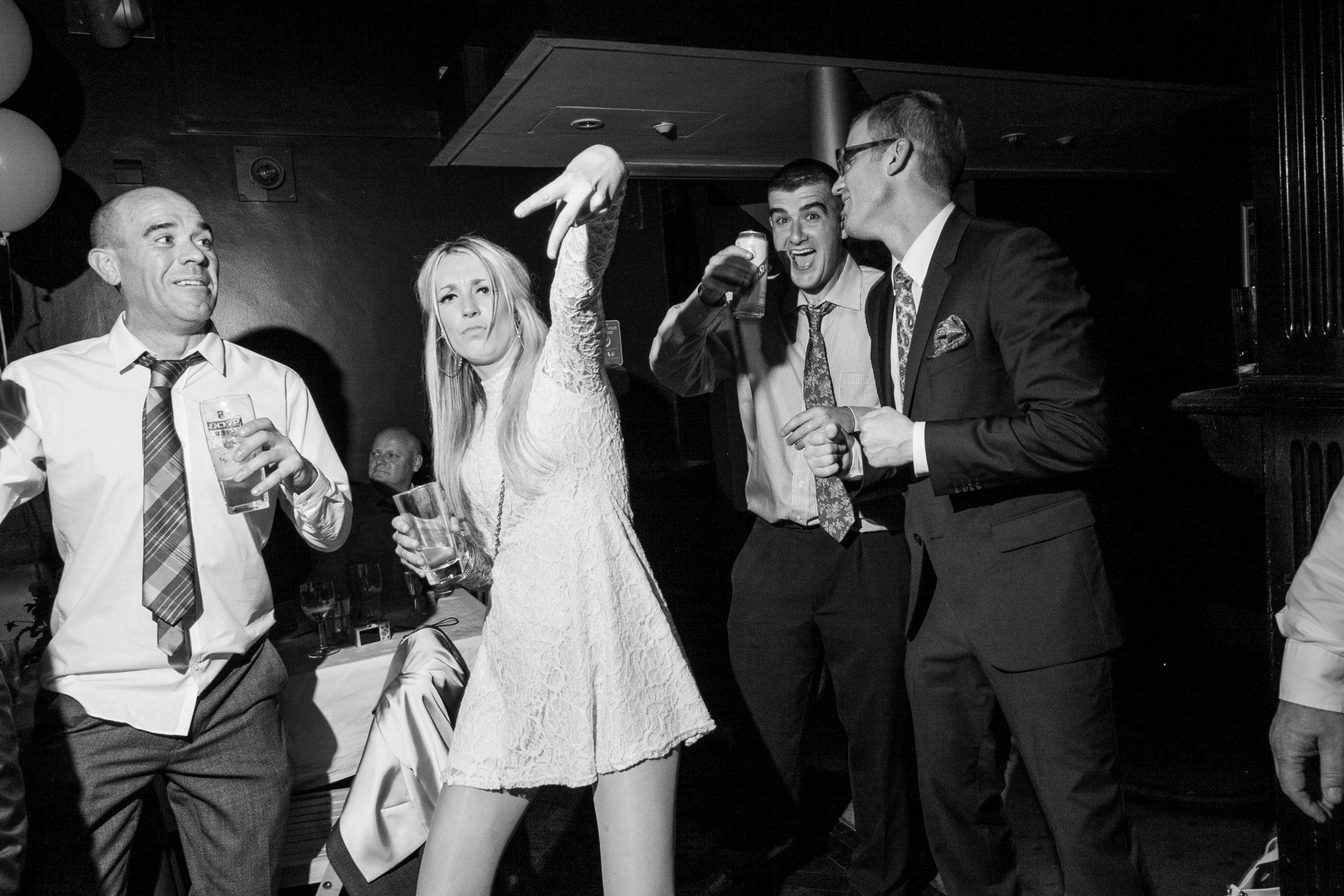 wedding guests having fun dancing at band on the wall Manchester