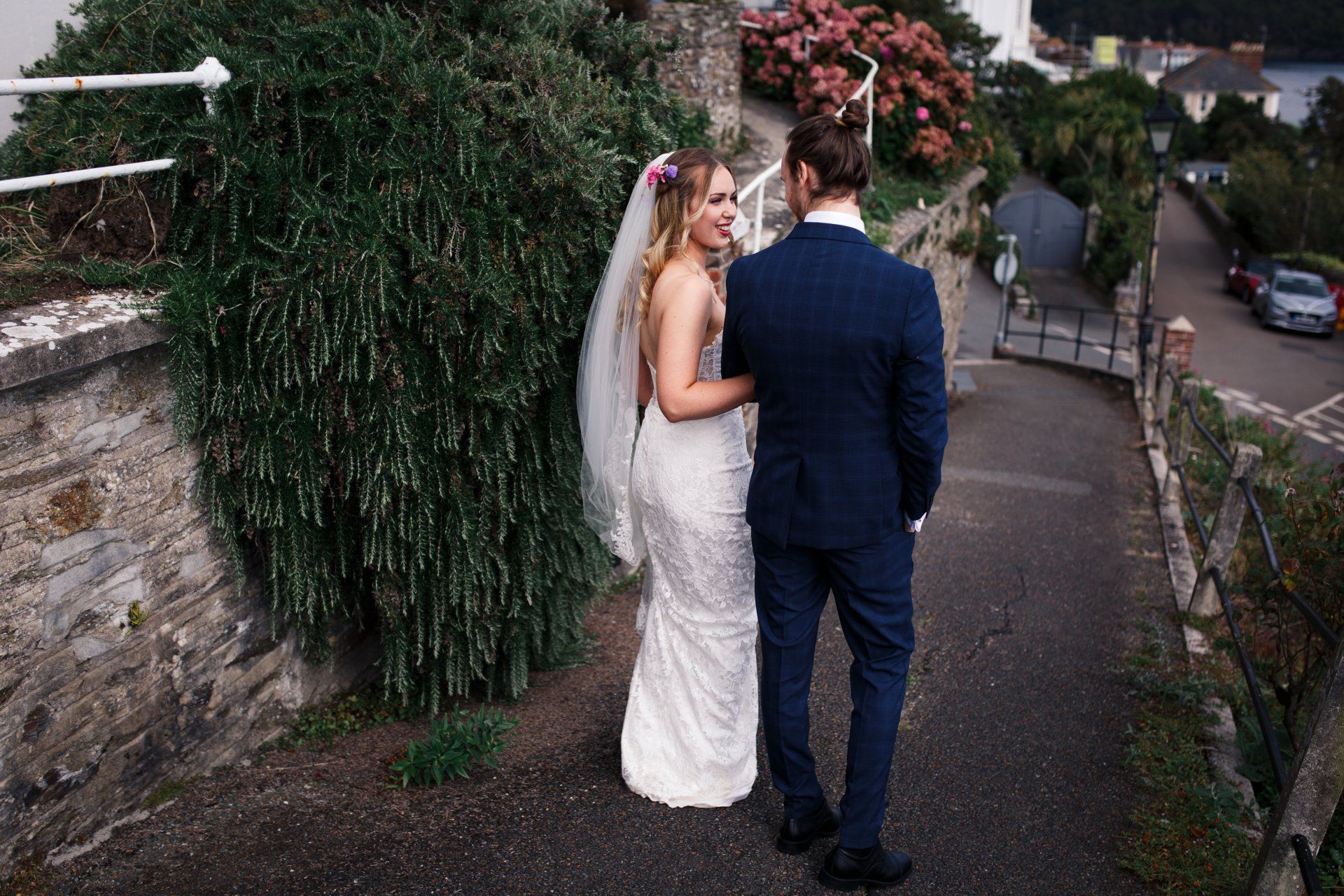 Romantic Fowey wedding photos bride taking groom by the arm