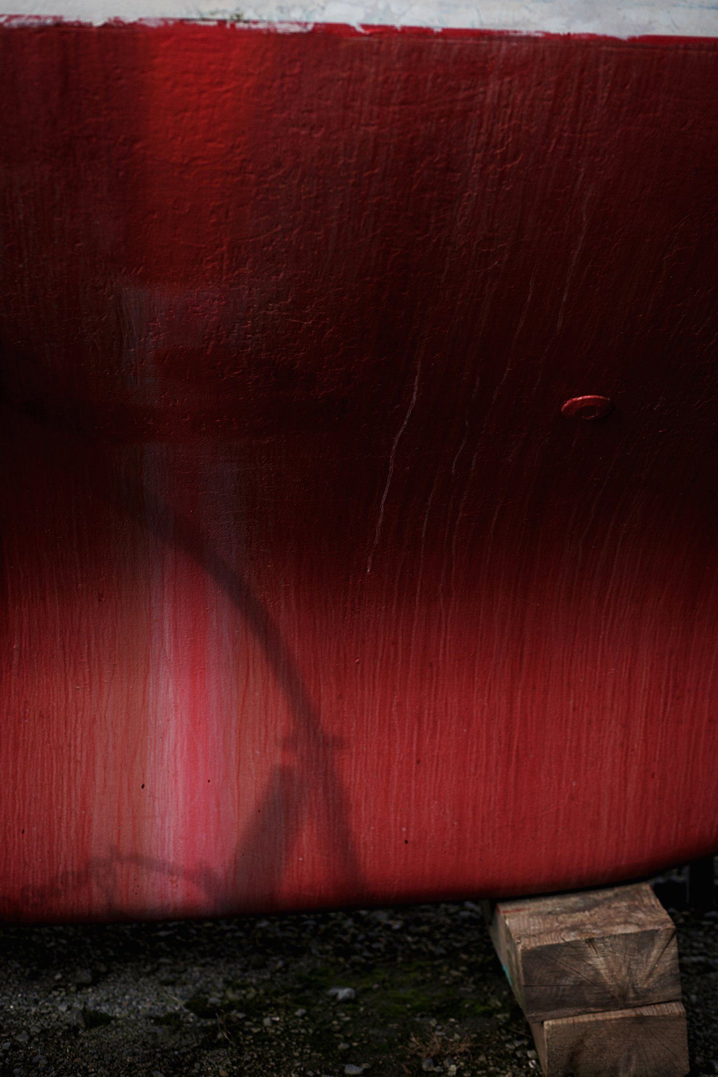 Boat in Gweek boatyard Cornwall abstract deep colour red