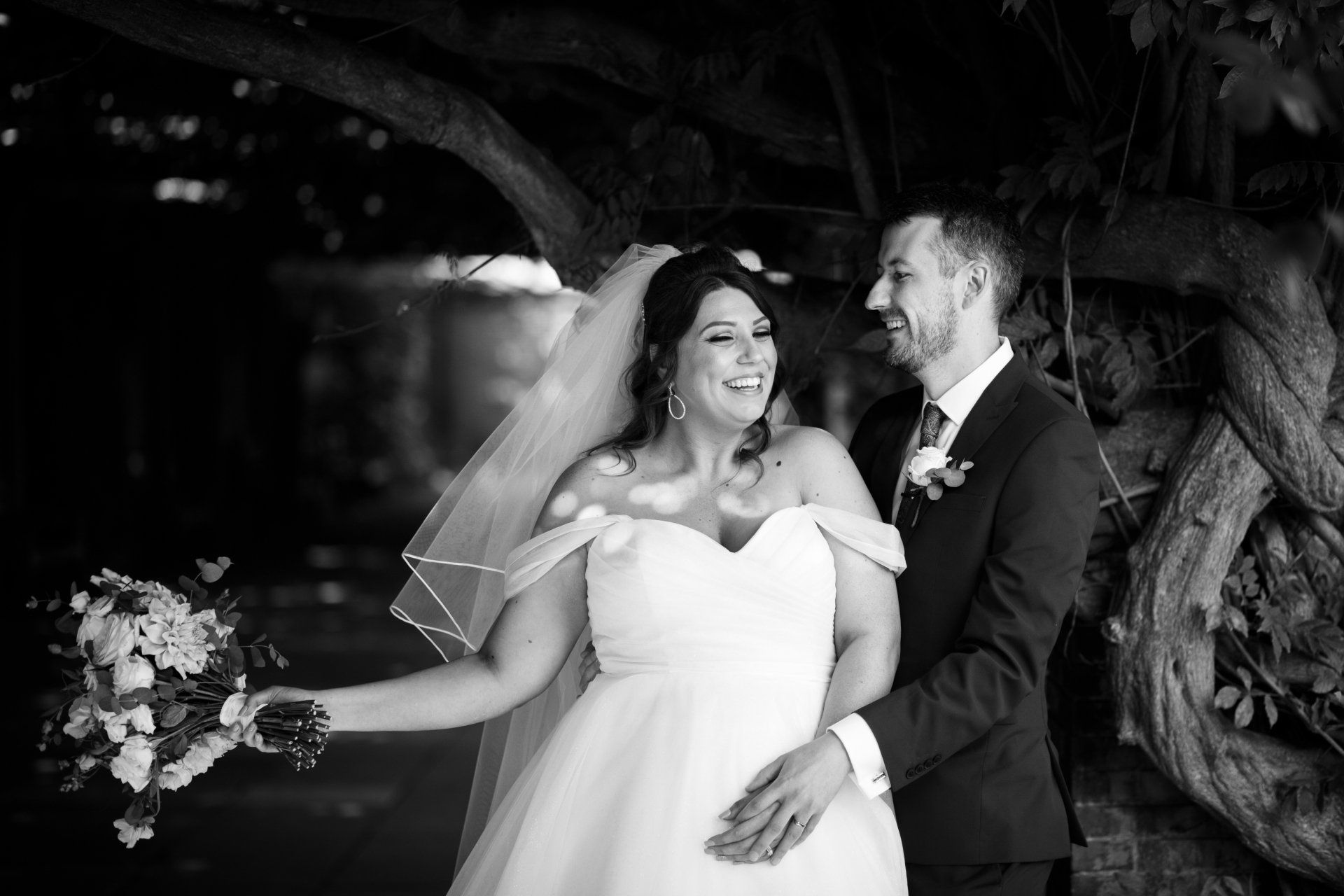 The Sun Pavilion wedding photography bride and groom share a warm moment