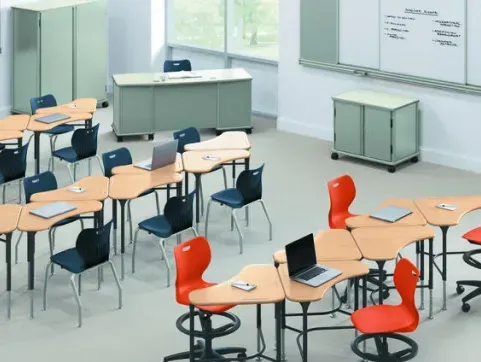 Open office setup with desks, chairs
