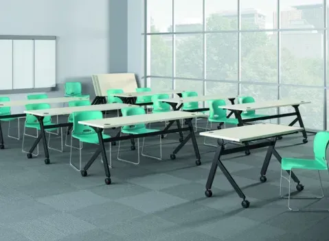Ergonomic workspace designed with bright green chairs and modern desks