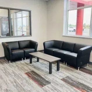 A living room with two couches and a coffee table.