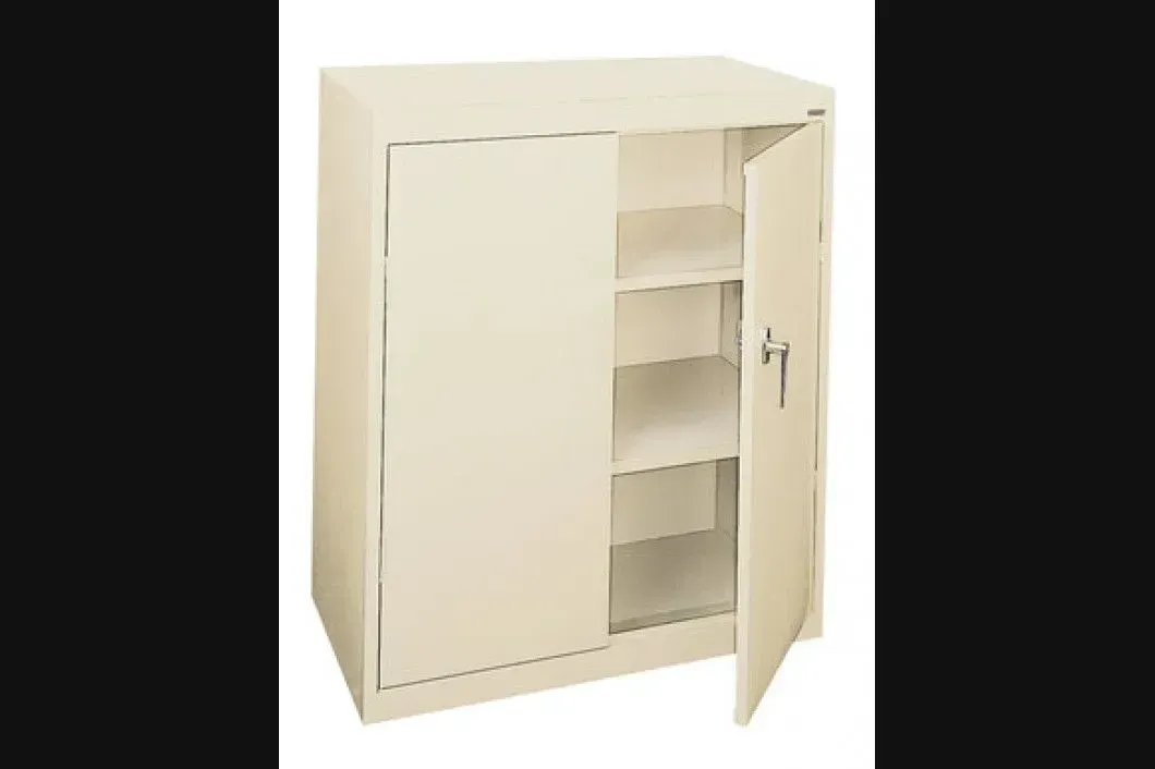 A white cabinet with two doors
