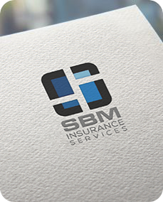 The logo for sbm insurance services is on a piece of paper