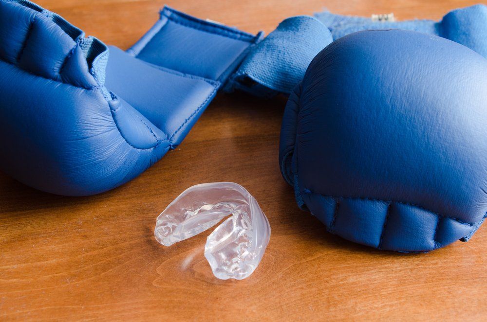 Boxing Gloves And Mouthguard — Central Coast Denture Clinic In Erina, NSW