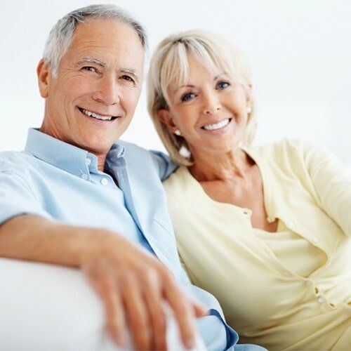 Older Couple Smiling — Dental Prosthetics In Erina, NSW