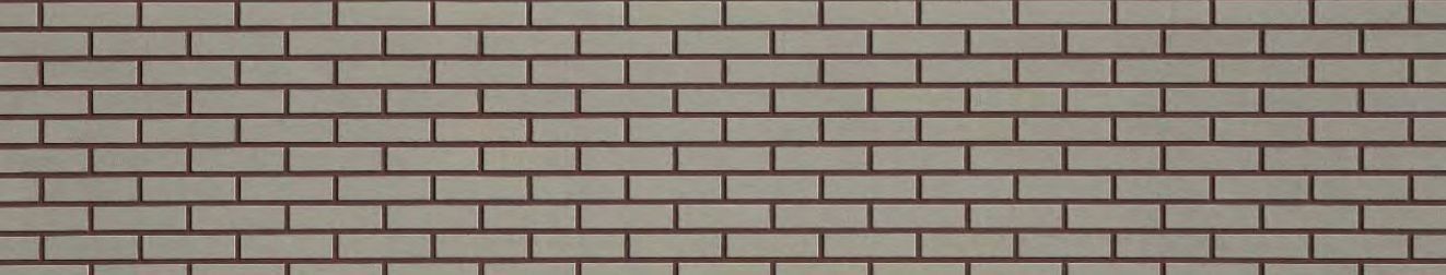 A close up of a brick wall with a pattern of squares.