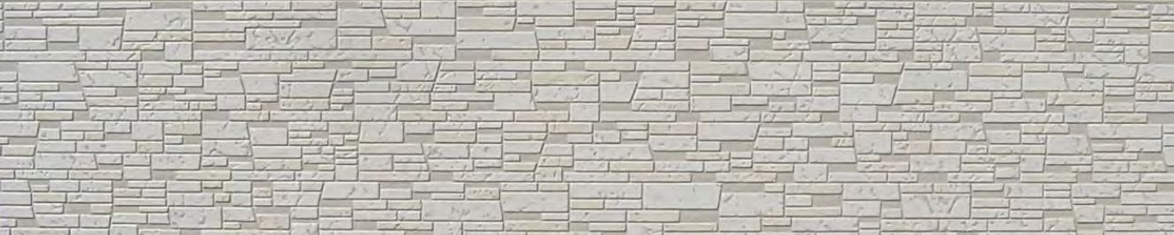 It looks like a brick wall with a geometric pattern.