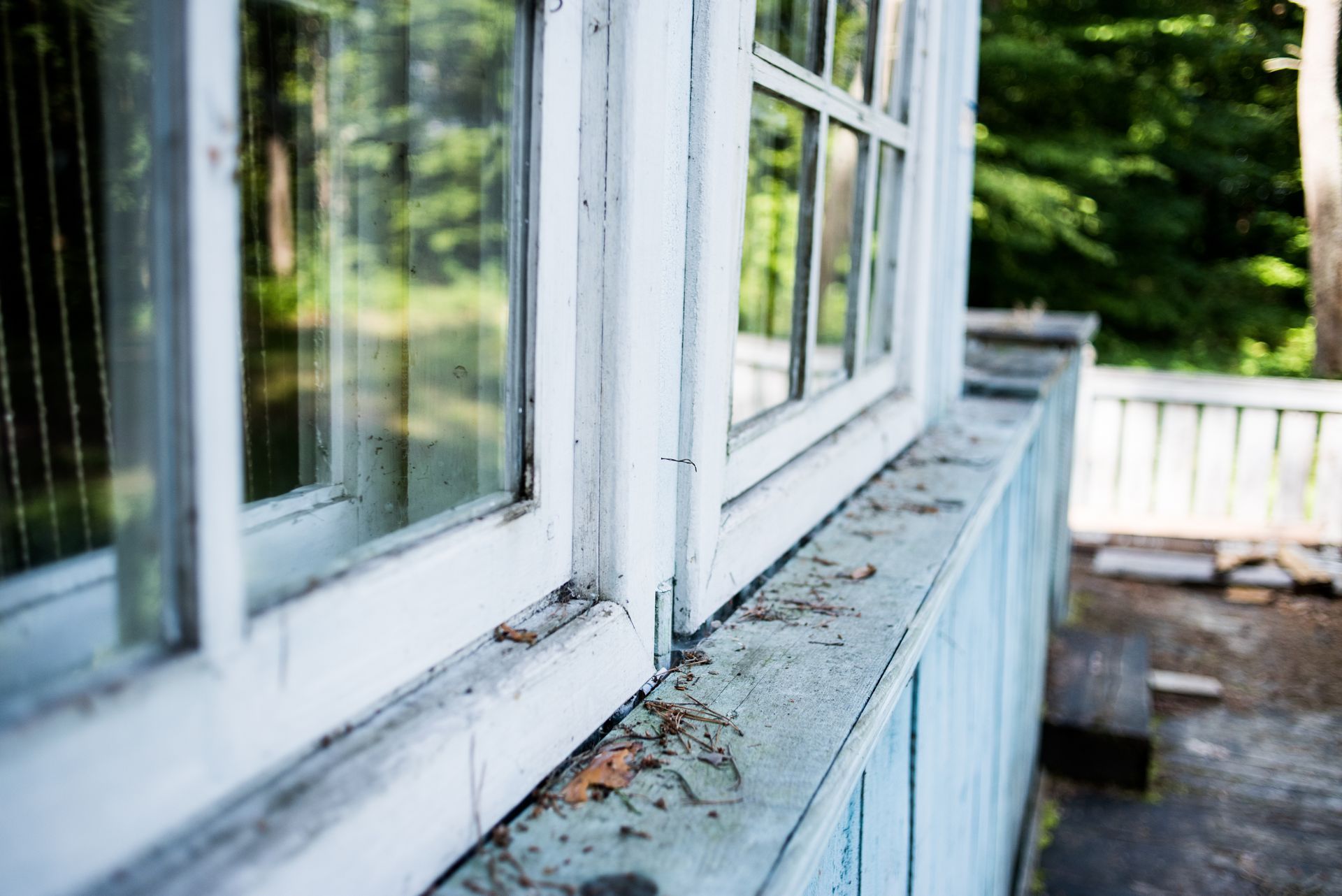 A close up of a window on the side of a house.