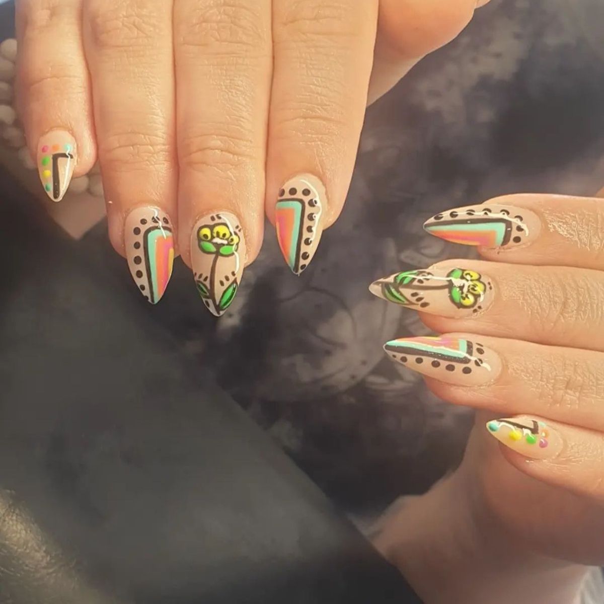 Hard gel nail overlay with flowers and rainbow colour theme