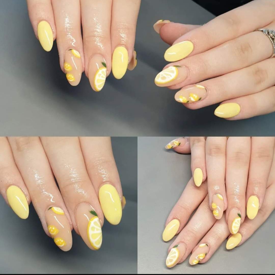 Hard gel nail extensions with lemon art