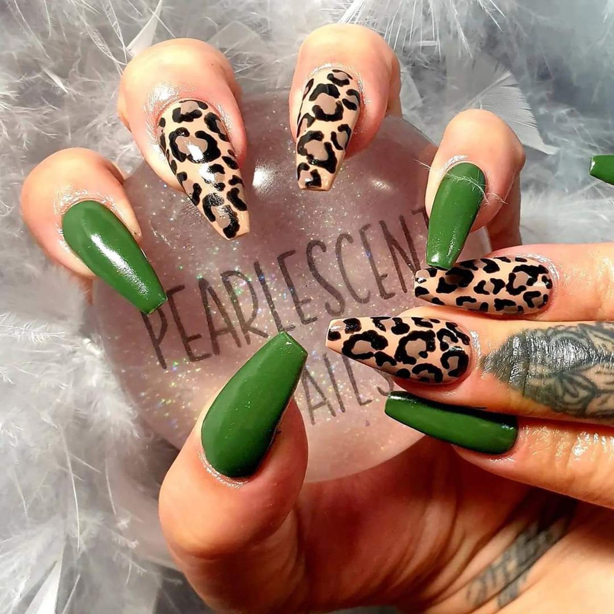 Hard gel nail extensions with green and leopard print design
