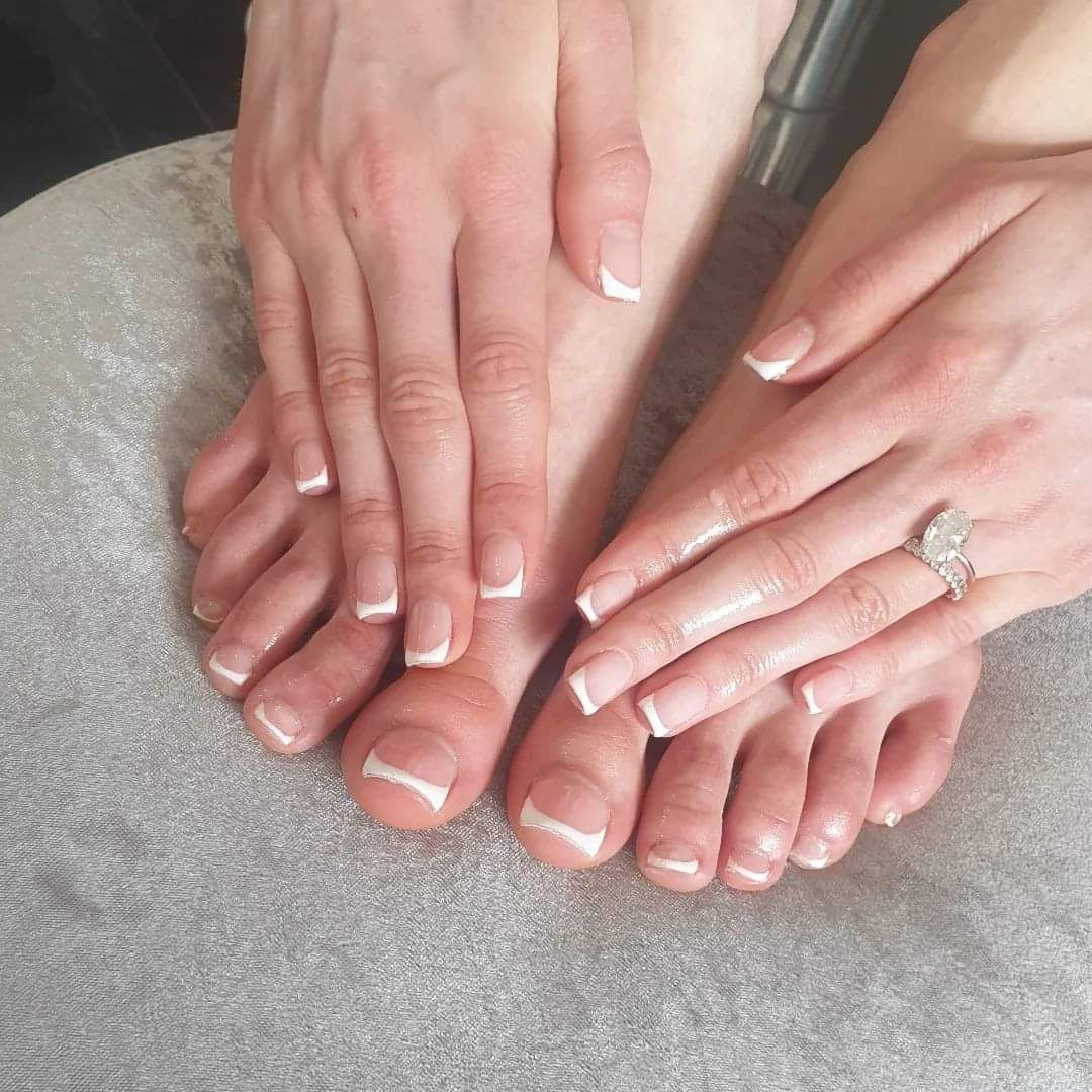 Manicure and deluxe pedicure with French nail polish