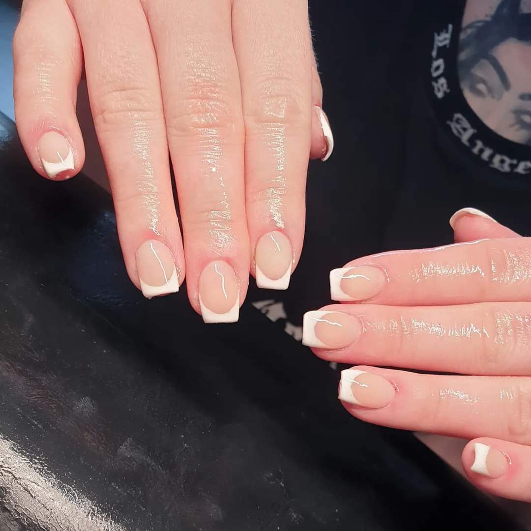 Hard gel nail extensions with French gel polish