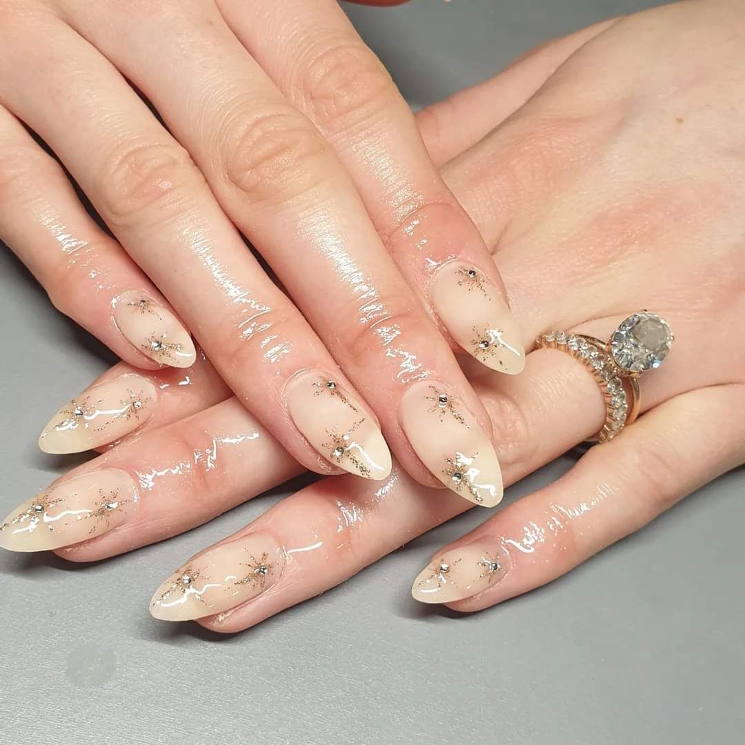 Hard gel nail overlay with gold stars nail art