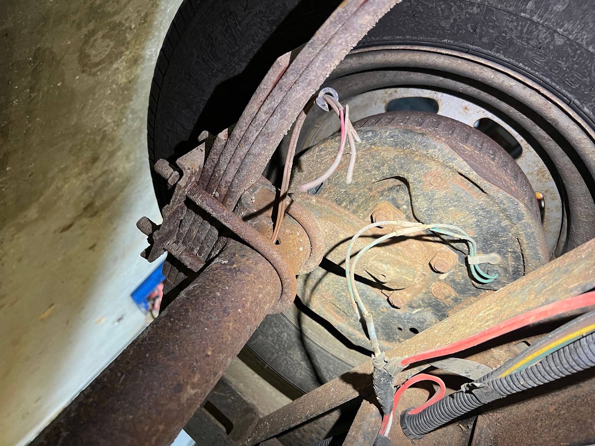 trailer wires and leaf springs and tire 