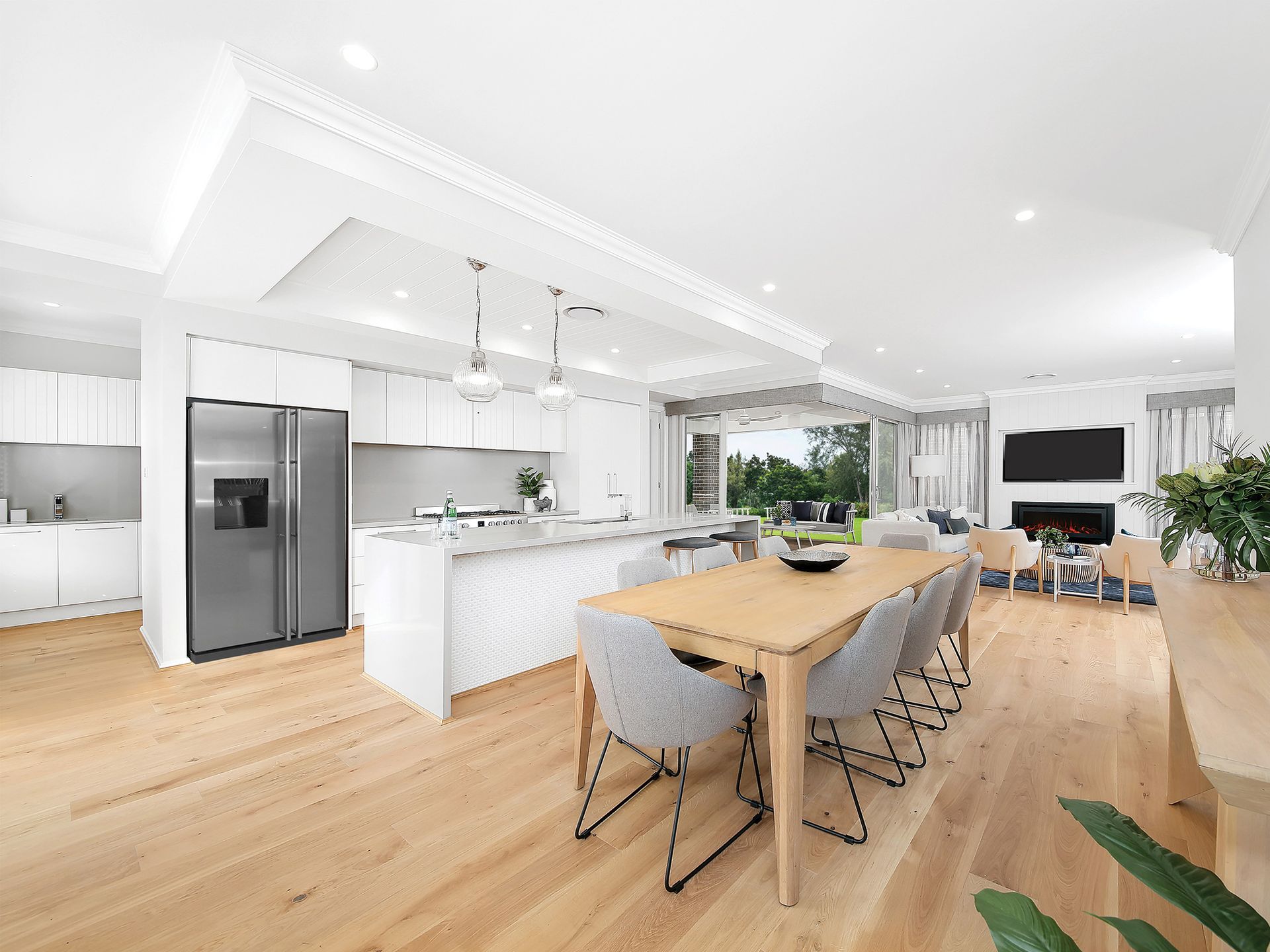 Chateaux 35 home design - There is a dining table and chairs in the middle of the room.