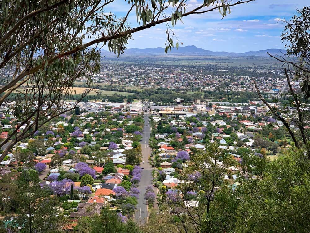 An Aerial View of A City Surrounded by Trees and Mountains — DW Fencing Tamworth in Tamworth, NSW