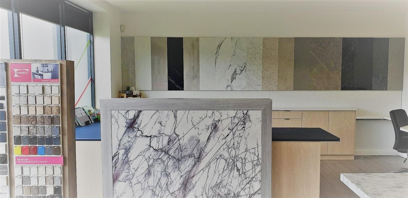 A Room with A Display of Different Types of Marble — Thats Tops by Design in Taminda, NSW
