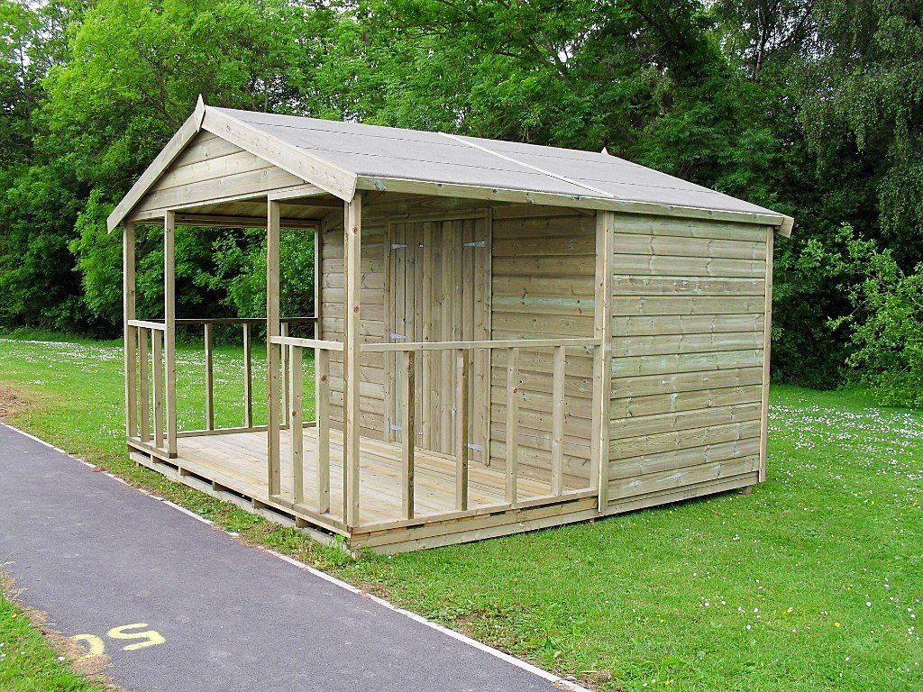 Bespoke building with verandah and tiled roof by CP Sheds Devon