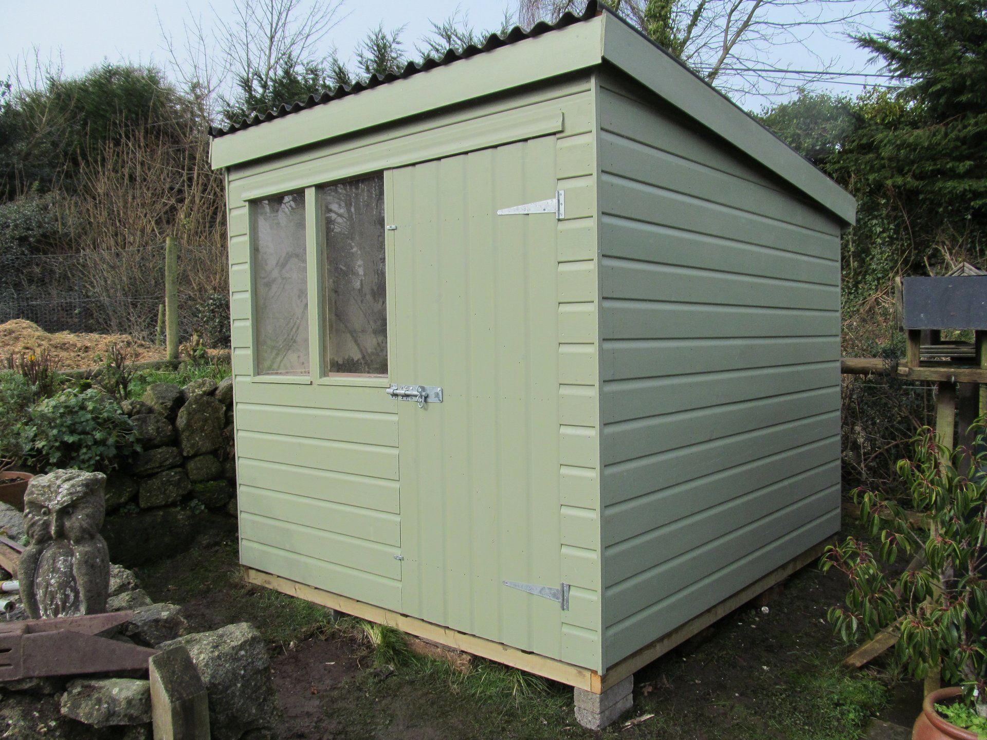 Painted Pent Shed with door and widnows to the front