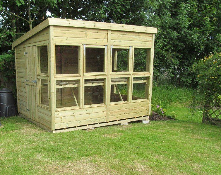 Garden Potting Shed with side door and lots of windows for growing plants