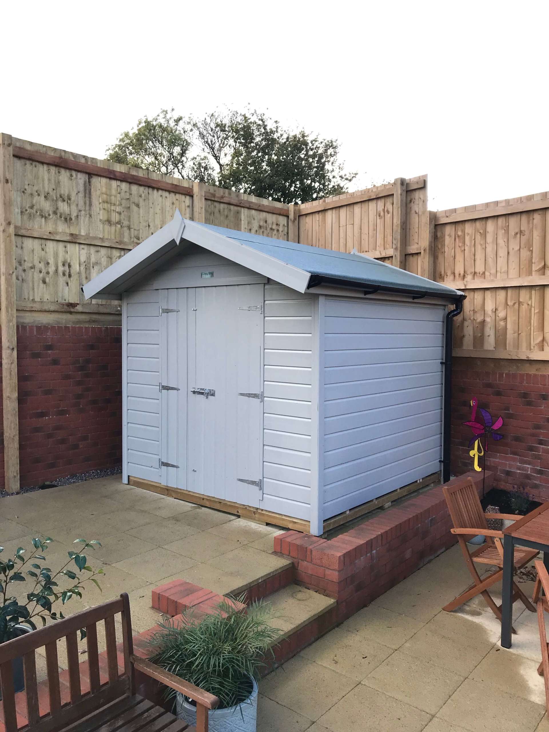 Painted Apex workshop garden shed with double door to the front and no windows