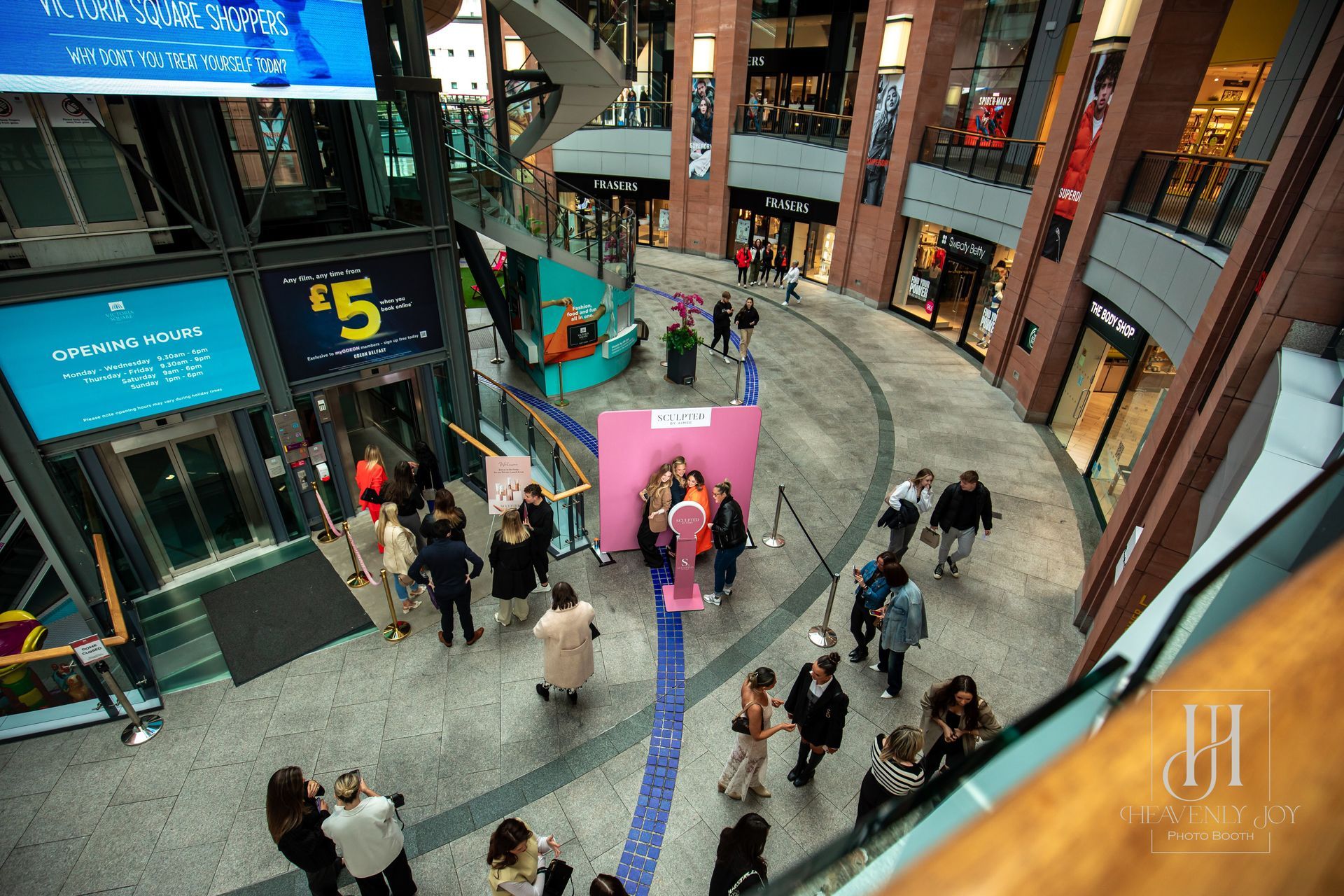 Customized photo booth activation featuring branded graphics for a corporate event.