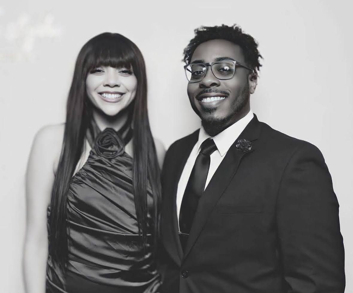 Friends capturing memories with a black and white photo booth rental in Iselin, NJ