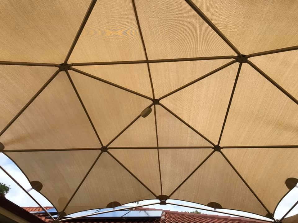 Looking up at the ceiling of a dome shaped structure