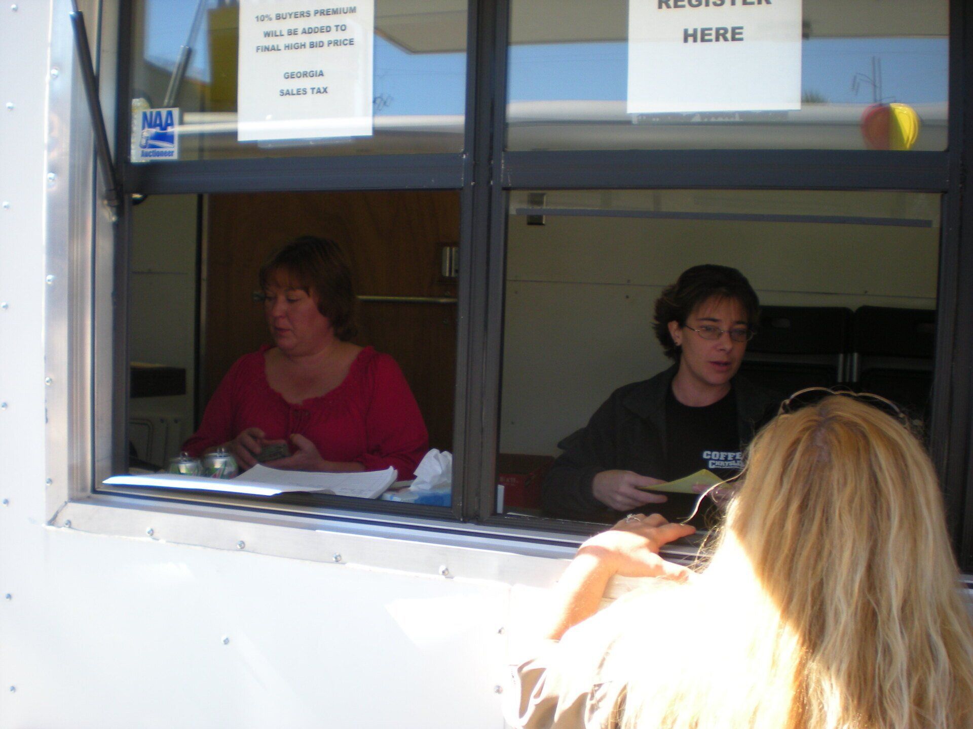 Person Wearing Glasses Talking To Another Person - Marion, IL - Taylor Auction and Realty