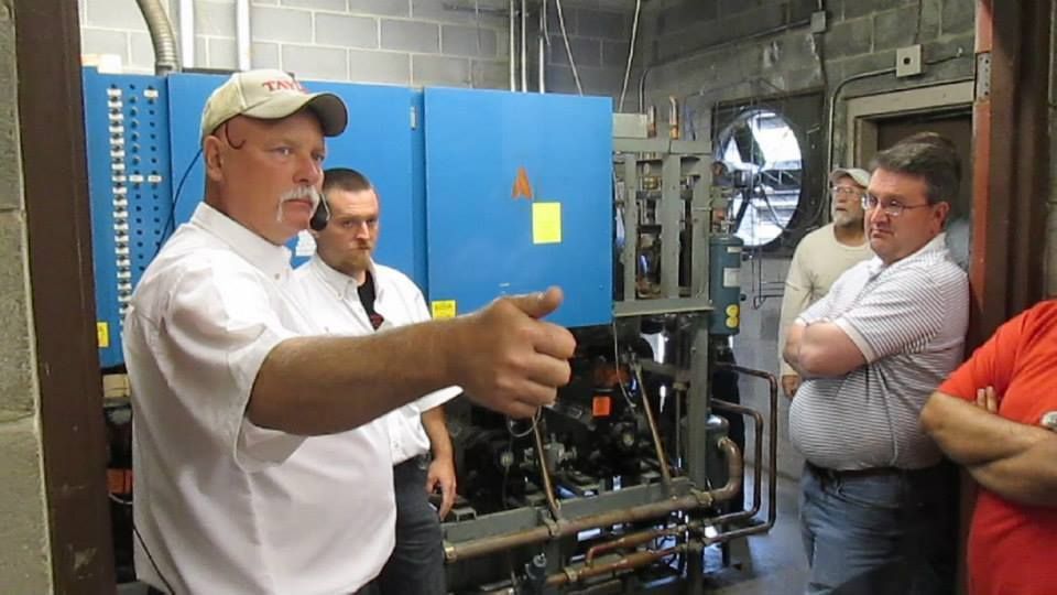 People Near Machine - Marion, IL - Taylor Auction and Realty