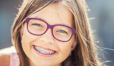 General Dentistry — Girl With Braces Smiling in Bala Cynwyd, PA