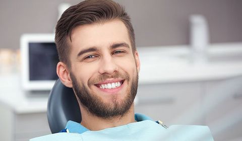 Implant Dentistry — A Man Getting His Teeth Checked in Bala Cynwyd, PA