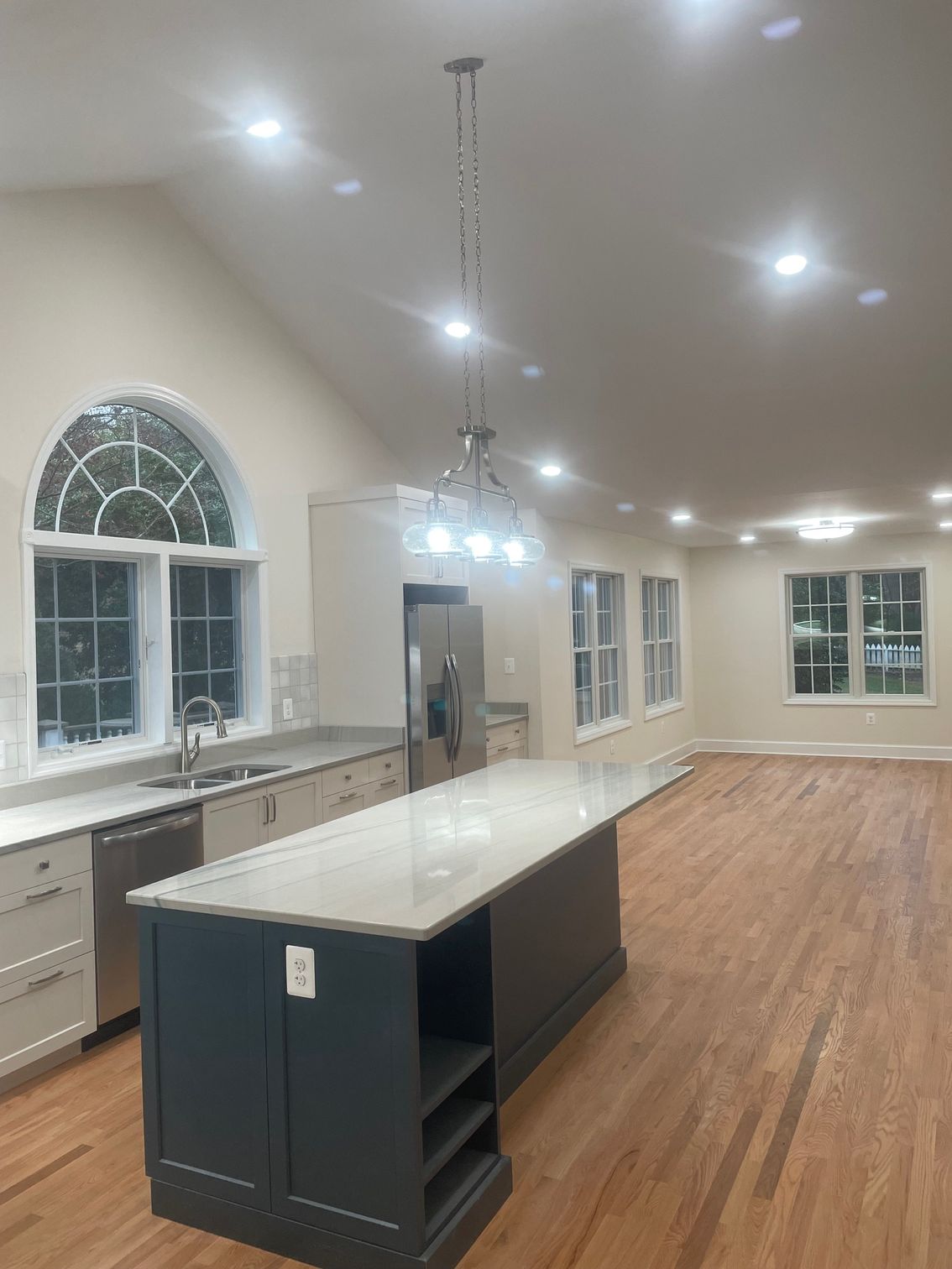 There is a large island in the middle of the kitchen.