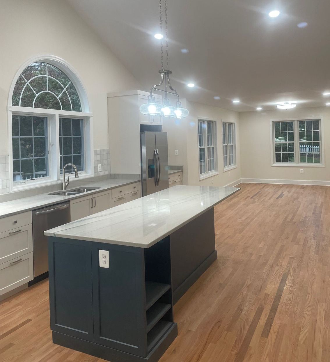 A kitchen with a large island in the middle of it