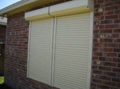 Manual and Electric Roll-up Hurricane Shutter — Protected Window with Hurricane Shutter  in Corpus Christi, TX