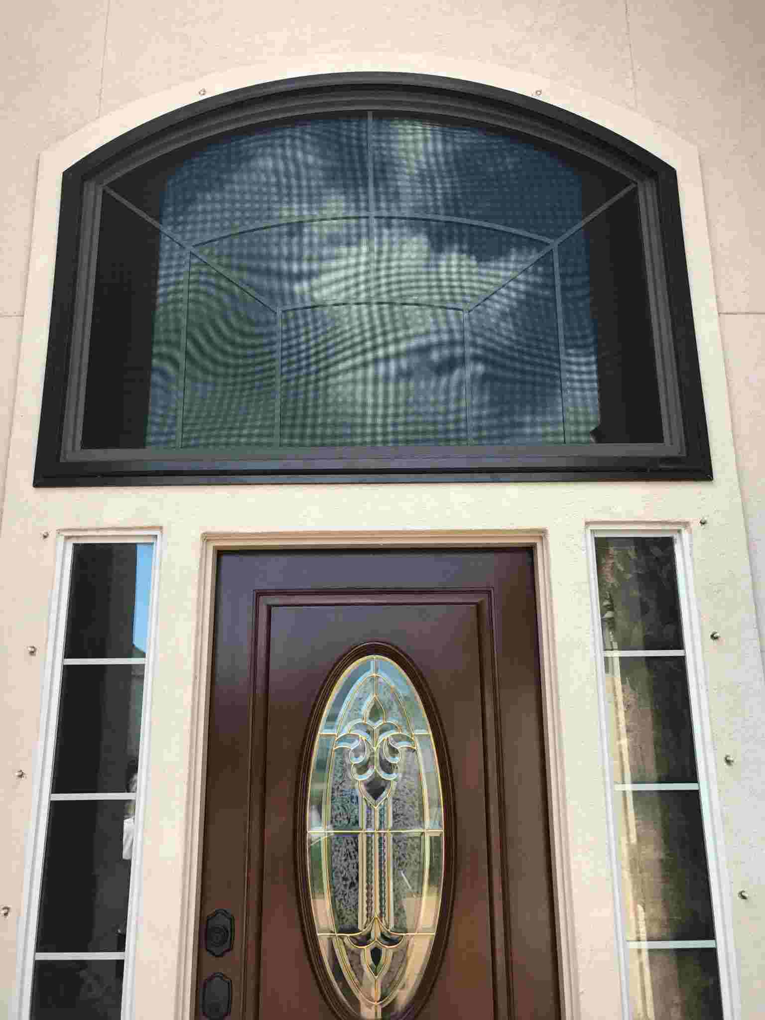 Hurricane security screen for arched window coverings