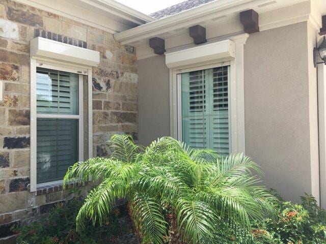 Hurricane roll up shutters for exterior windows
