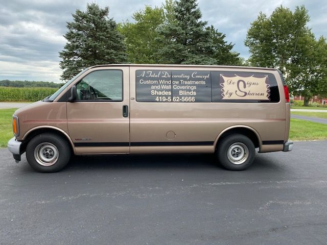 Tan van with text