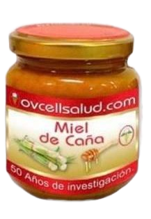 Tarro de Miel de Caña con tapa y etiqueta naranjas. Etiqueta blanca con texto e ilustración de caña de azúcar.