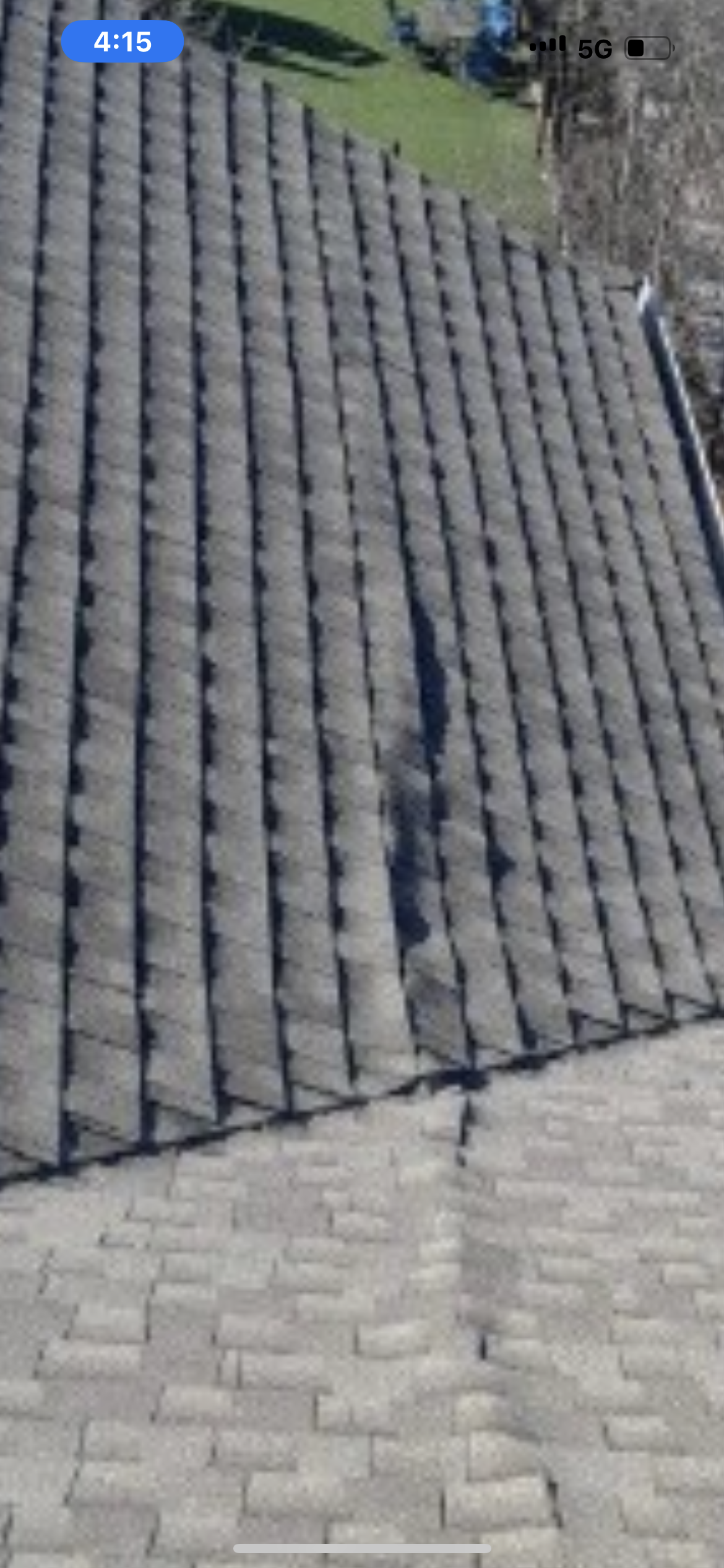 A close up of a roof with a lot of tiles on it.